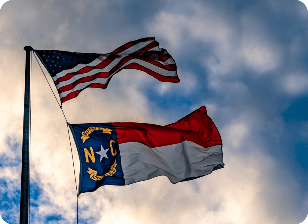 american flag and north carolina state flag